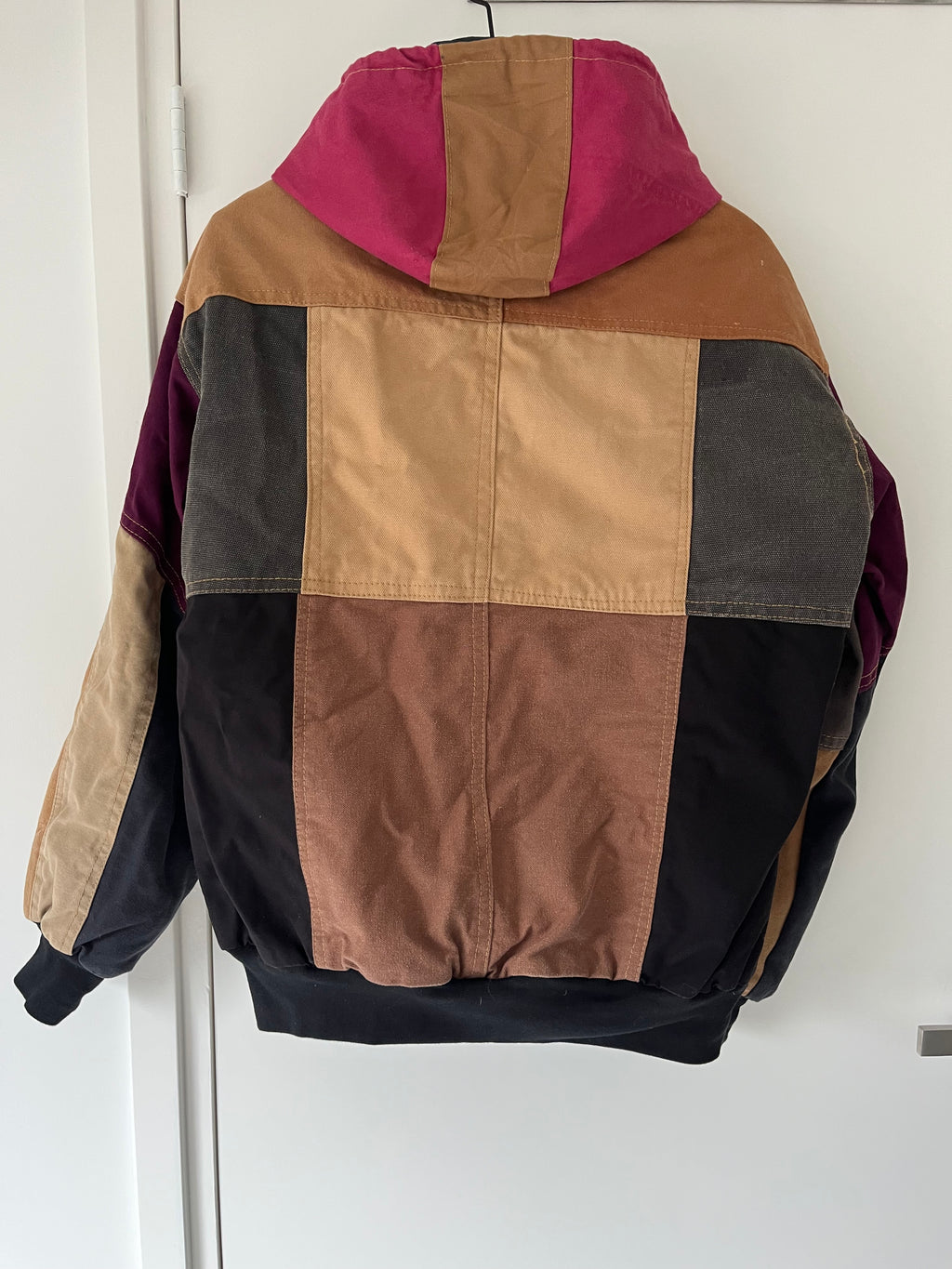 Carhartt reworked jacket with pink hoodie